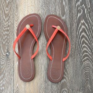 Tory Burch Women's Orange Flip Flops with Gold Emblem